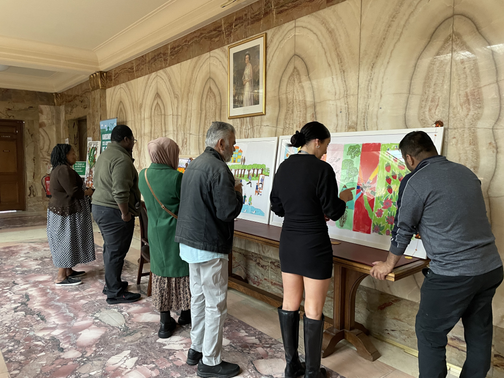 People looking at artwork