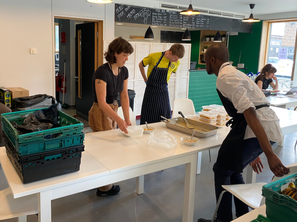 Students help to prepare, cook and distribute nutritious meals from a refurbished community caf﻿é at the Black Prince Community Hub in Vauxhall