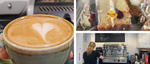 Close up of coffee cup with latte, cake and lady making a coffee at a barista coffee machine