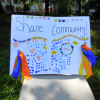 Homemade sign saying Share Community