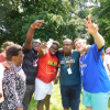 A group of Share students smiling and waving