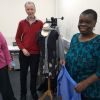 Edmond and Joyce dressing the mannequin