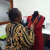 Makedah dressing the mannequin