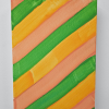 Close up of abstract painting, bold green, orange and yellow diagonal stripes